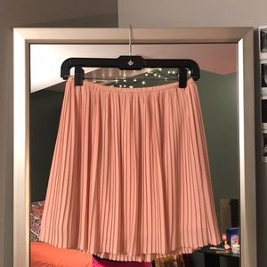 pleated pink skirt